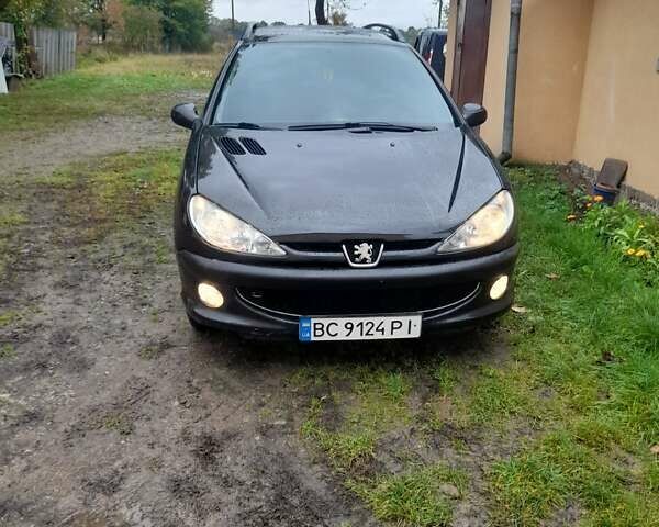 Черный Пежо 206, объемом двигателя 1.4 л и пробегом 298 тыс. км за 2896 $, фото 9 на Automoto.ua