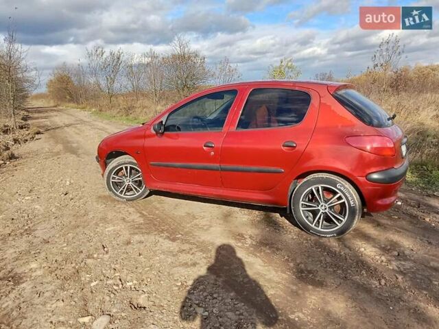 Червоний Пежо 206, об'ємом двигуна 1.4 л та пробігом 458 тис. км за 2450 $, фото 3 на Automoto.ua