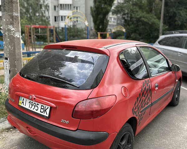 Красный Пежо 206, объемом двигателя 1.1 л и пробегом 222 тыс. км за 2000 $, фото 3 на Automoto.ua