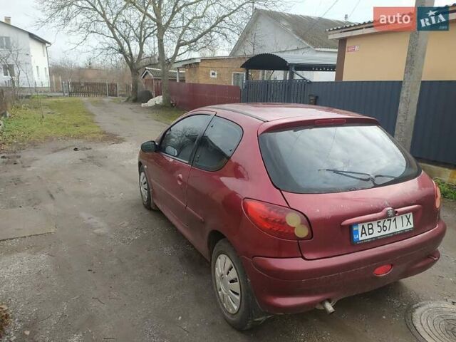 Красный Пежо 206, объемом двигателя 1.87 л и пробегом 315 тыс. км за 2700 $, фото 1 на Automoto.ua