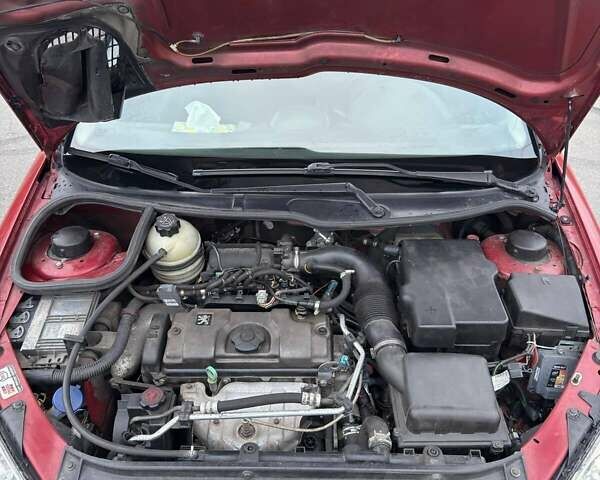 Красный Пежо 206, объемом двигателя 1.4 л и пробегом 179 тыс. км за 3600 $, фото 24 на Automoto.ua