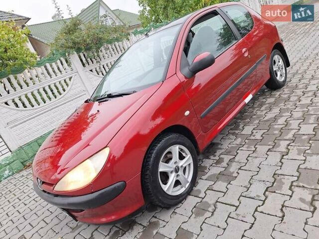 Красный Пежо 206, объемом двигателя 1.36 л и пробегом 230 тыс. км за 2200 $, фото 20 на Automoto.ua