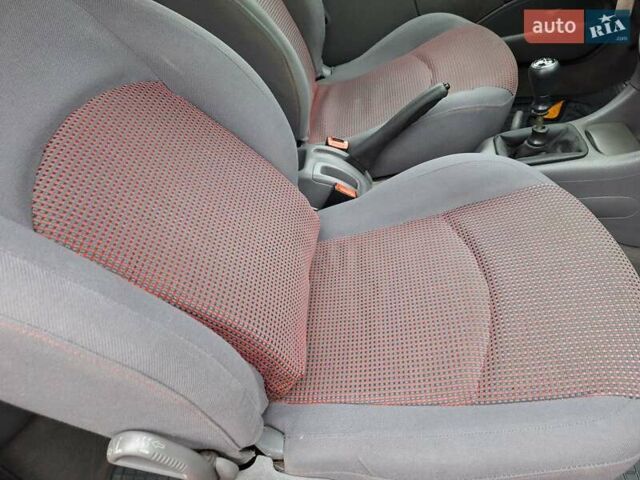 Красный Пежо 206, объемом двигателя 1.36 л и пробегом 230 тыс. км за 2200 $, фото 28 на Automoto.ua