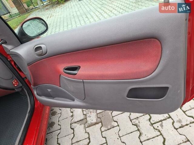 Красный Пежо 206, объемом двигателя 1.36 л и пробегом 230 тыс. км за 2200 $, фото 22 на Automoto.ua
