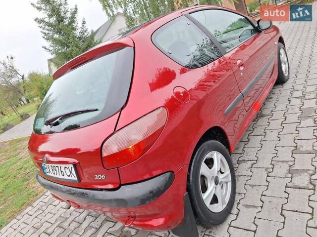 Красный Пежо 206, объемом двигателя 1.36 л и пробегом 230 тыс. км за 2200 $, фото 11 на Automoto.ua