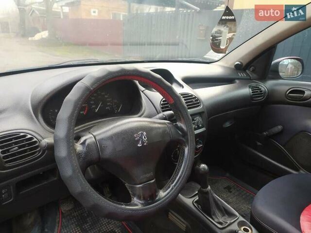 Красный Пежо 206, объемом двигателя 1.87 л и пробегом 315 тыс. км за 2700 $, фото 6 на Automoto.ua