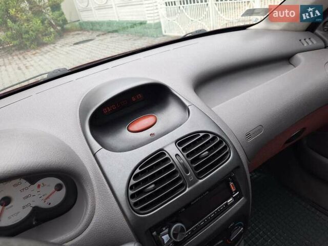 Красный Пежо 206, объемом двигателя 1.36 л и пробегом 230 тыс. км за 2200 $, фото 44 на Automoto.ua