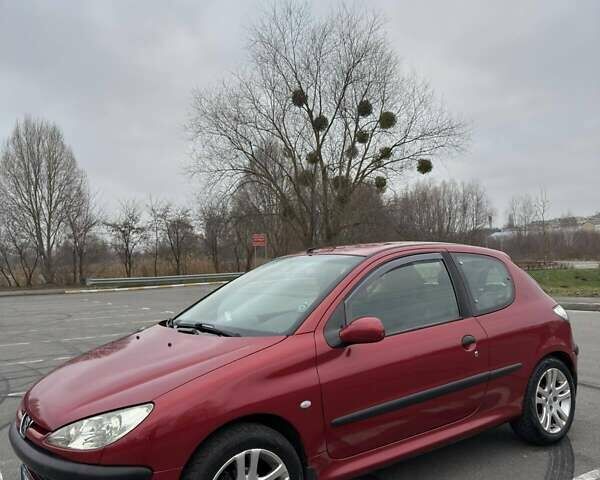 Красный Пежо 206, объемом двигателя 1.4 л и пробегом 179 тыс. км за 3600 $, фото 6 на Automoto.ua