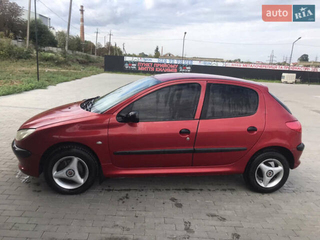Красный Пежо 206, объемом двигателя 1.4 л и пробегом 270 тыс. км за 3350 $, фото 5 на Automoto.ua