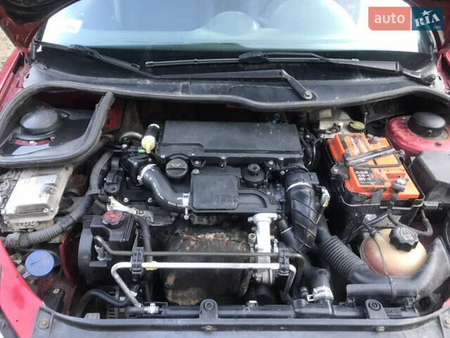 Красный Пежо 206, объемом двигателя 1.4 л и пробегом 270 тыс. км за 3350 $, фото 6 на Automoto.ua