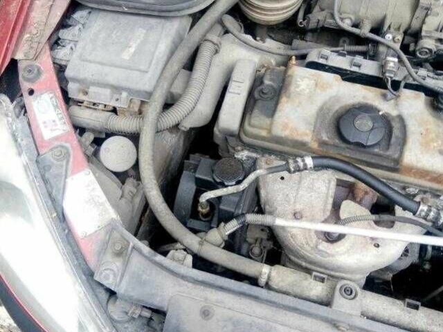 Красный Пежо 206, объемом двигателя 1.4 л и пробегом 90 тыс. км за 1500 $, фото 8 на Automoto.ua