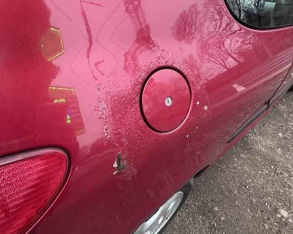 Червоний Пежо 206, об'ємом двигуна 1.12 л та пробігом 161 тис. км за 2200 $, фото 9 на Automoto.ua