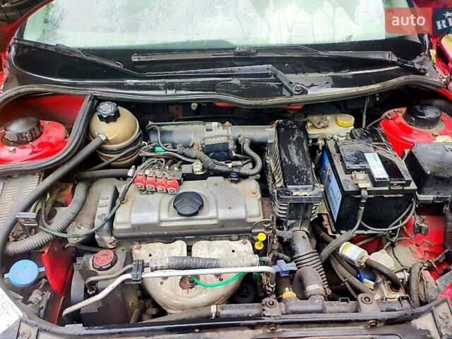 Красный Пежо 206, объемом двигателя 1.4 л и пробегом 211 тыс. км за 3000 $, фото 6 на Automoto.ua
