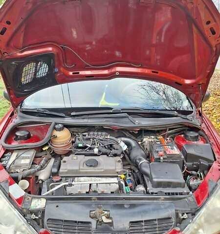 Красный Пежо 206, объемом двигателя 1.4 л и пробегом 199 тыс. км за 3900 $, фото 15 на Automoto.ua