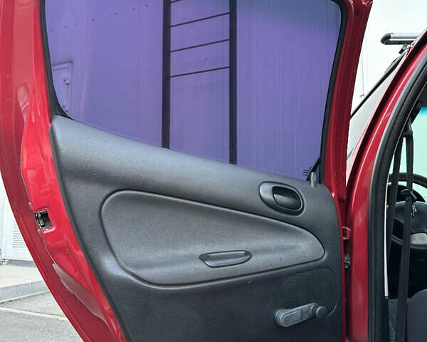 Красный Пежо 206, объемом двигателя 1.4 л и пробегом 263 тыс. км за 2600 $, фото 20 на Automoto.ua