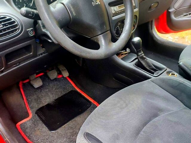 Червоний Пежо 206, об'ємом двигуна 1.4 л та пробігом 211 тис. км за 3000 $, фото 12 на Automoto.ua