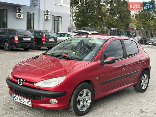 Червоний Пежо 206, об'ємом двигуна 1.59 л та пробігом 195 тис. км за 3800 $, фото 10 на Automoto.ua