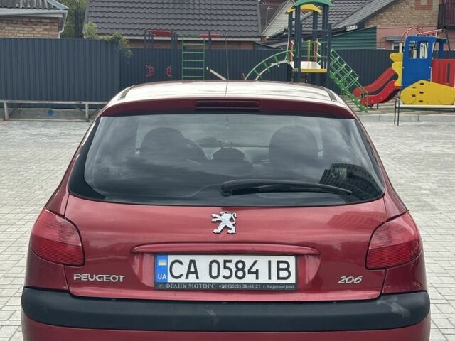 Красный Пежо 206, объемом двигателя 1.6 л и пробегом 195 тыс. км за 3750 $, фото 6 на Automoto.ua