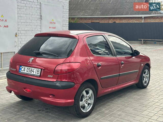Червоний Пежо 206, об'ємом двигуна 1.59 л та пробігом 195 тис. км за 3800 $, фото 5 на Automoto.ua