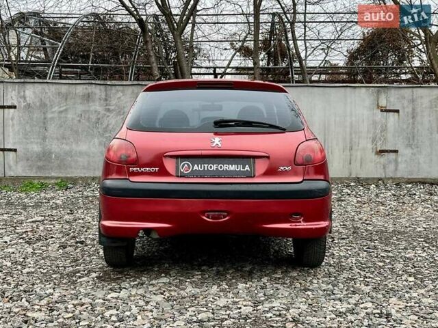 Красный Пежо 206, объемом двигателя 1.36 л и пробегом 232 тыс. км за 2990 $, фото 5 на Automoto.ua