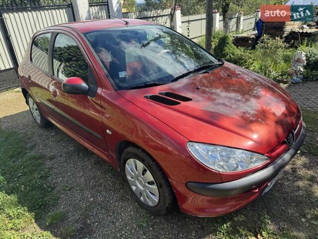 Красный Пежо 206, объемом двигателя 1.36 л и пробегом 133 тыс. км за 4200 $, фото 6 на Automoto.ua