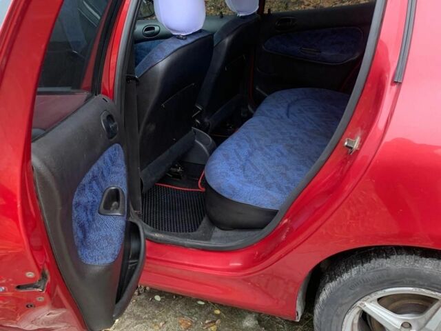 Червоний Пежо 206, об'ємом двигуна 1.6 л та пробігом 218 тис. км за 3500 $, фото 9 на Automoto.ua