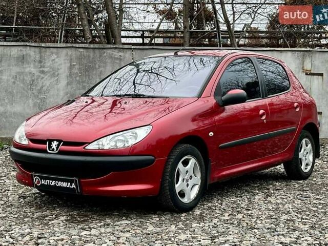 Красный Пежо 206, объемом двигателя 1.36 л и пробегом 232 тыс. км за 2990 $, фото 3 на Automoto.ua