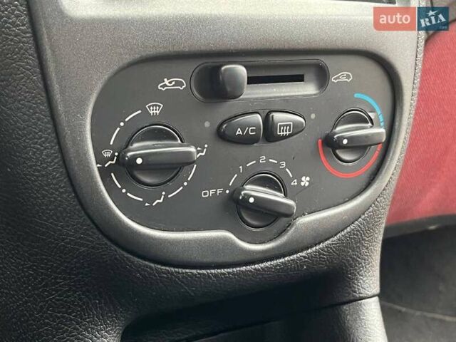 Красный Пежо 206, объемом двигателя 1.36 л и пробегом 232 тыс. км за 2990 $, фото 16 на Automoto.ua