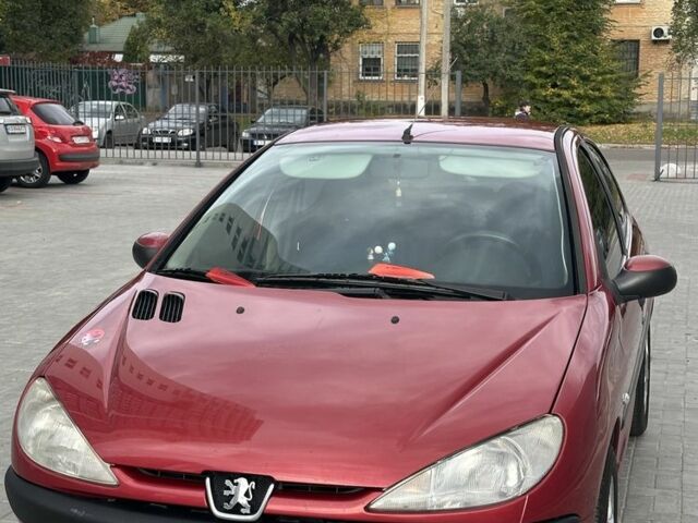 Красный Пежо 206, объемом двигателя 1.6 л и пробегом 195 тыс. км за 3750 $, фото 12 на Automoto.ua