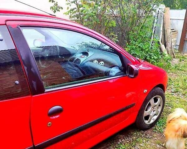 Красный Пежо 206, объемом двигателя 1.4 л и пробегом 211 тыс. км за 3000 $, фото 2 на Automoto.ua