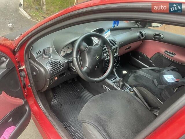 Красный Пежо 206, объемом двигателя 1.4 л и пробегом 221 тыс. км за 3300 $, фото 5 на Automoto.ua