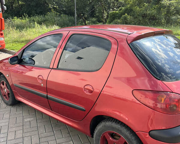 Красный Пежо 206, объемом двигателя 1.4 л и пробегом 180 тыс. км за 3350 $, фото 9 на Automoto.ua