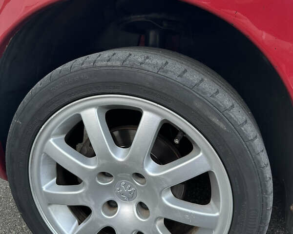 Красный Пежо 206, объемом двигателя 1.4 л и пробегом 263 тыс. км за 2600 $, фото 24 на Automoto.ua