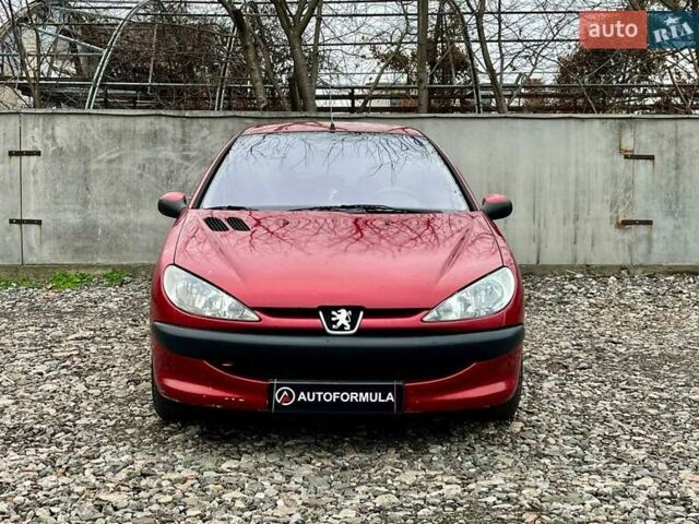 Красный Пежо 206, объемом двигателя 1.36 л и пробегом 232 тыс. км за 2990 $, фото 2 на Automoto.ua