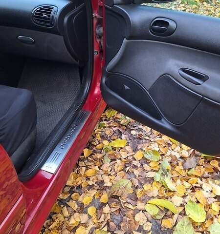 Красный Пежо 206, объемом двигателя 1.4 л и пробегом 199 тыс. км за 3900 $, фото 9 на Automoto.ua