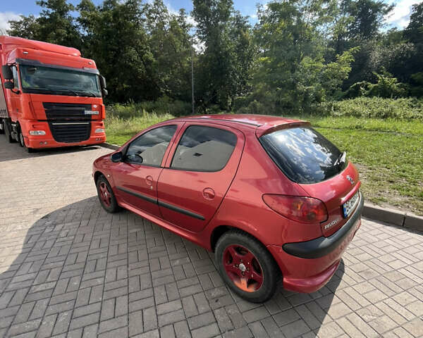 Красный Пежо 206, объемом двигателя 1.4 л и пробегом 180 тыс. км за 3350 $, фото 1 на Automoto.ua