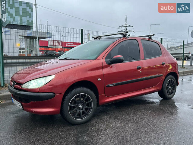Красный Пежо 206, объемом двигателя 1.4 л и пробегом 263 тыс. км за 2600 $, фото 25 на Automoto.ua