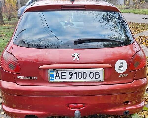 Красный Пежо 206, объемом двигателя 1.4 л и пробегом 199 тыс. км за 3900 $, фото 6 на Automoto.ua