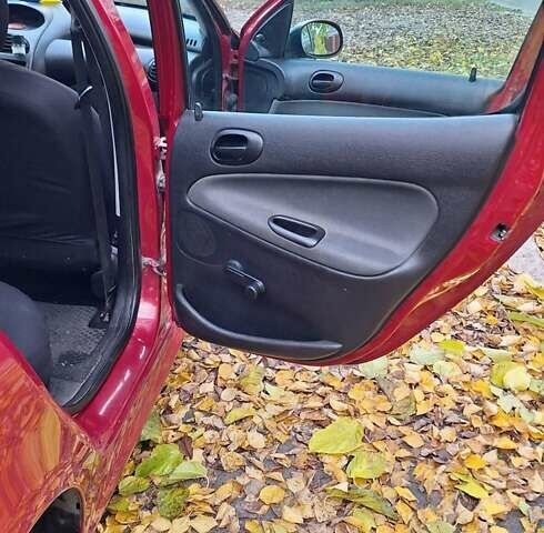 Красный Пежо 206, объемом двигателя 1.4 л и пробегом 199 тыс. км за 3900 $, фото 8 на Automoto.ua