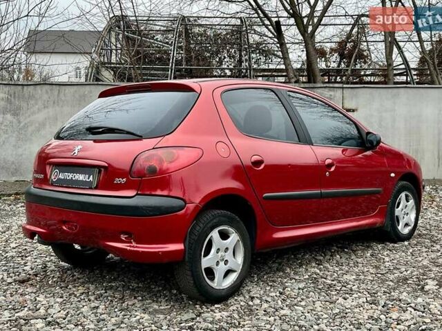 Красный Пежо 206, объемом двигателя 1.36 л и пробегом 232 тыс. км за 2990 $, фото 6 на Automoto.ua