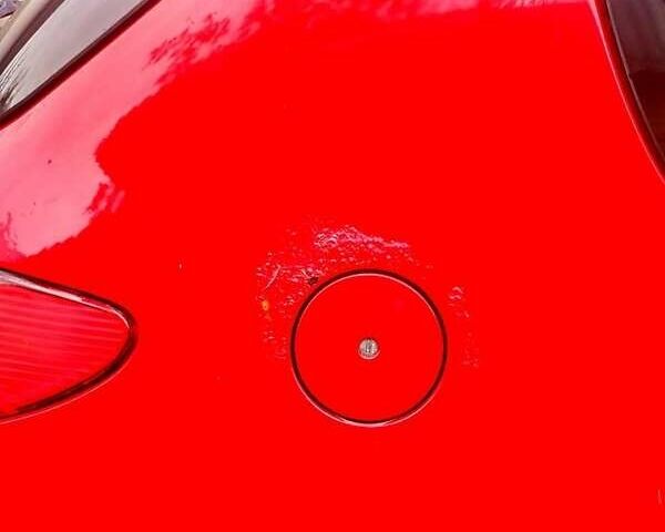 Красный Пежо 206, объемом двигателя 1.4 л и пробегом 211 тыс. км за 3000 $, фото 5 на Automoto.ua