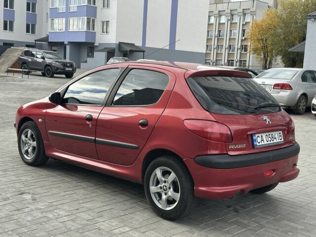 Красный Пежо 206, объемом двигателя 1.6 л и пробегом 195 тыс. км за 3750 $, фото 10 на Automoto.ua