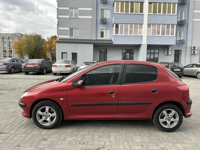 Красный Пежо 206, объемом двигателя 1.6 л и пробегом 195 тыс. км за 3750 $, фото 9 на Automoto.ua
