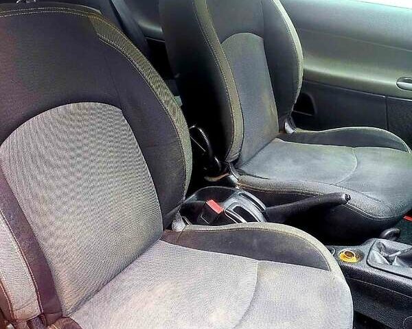 Красный Пежо 206, объемом двигателя 1.4 л и пробегом 211 тыс. км за 3000 $, фото 3 на Automoto.ua