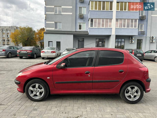 Червоний Пежо 206, об'ємом двигуна 1.59 л та пробігом 195 тис. км за 3800 $, фото 7 на Automoto.ua