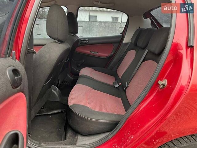 Красный Пежо 206, объемом двигателя 1.36 л и пробегом 232 тыс. км за 2990 $, фото 8 на Automoto.ua