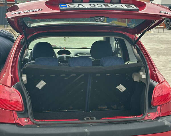 Червоний Пежо 206, об'ємом двигуна 1.59 л та пробігом 195 тис. км за 3800 $, фото 24 на Automoto.ua