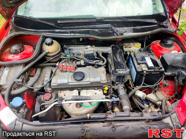 Червоний Пежо 206, об'ємом двигуна 1.4 л та пробігом 211 тис. км за 3000 $, фото 7 на Automoto.ua