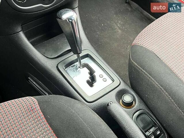 Красный Пежо 206, объемом двигателя 1.36 л и пробегом 232 тыс. км за 2990 $, фото 15 на Automoto.ua