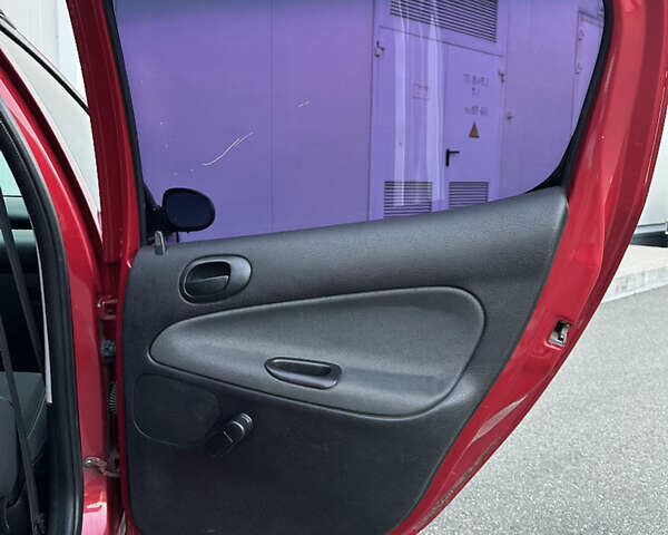 Красный Пежо 206, объемом двигателя 1.4 л и пробегом 263 тыс. км за 2600 $, фото 22 на Automoto.ua